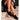 Mocasín negro de mujer Pink Desert en vista lateral sobre escalones de piedra - © Calzados Modesto®
