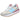 Zapatillas deportivas New Balance beige de ante y malla con detalles azules y rosas - © Calzados Modesto®