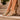 Sandalias doradas XTI de tiras entrelazadas y tacón bajo metalizado estilo casual - © Calzados Modesto®