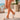 Vista lateral Adidas Adilette Shower Oro mujer en paseo marítimo - © Calzados Modesto®