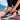 Zapatillas deportivas Adidas negras de running con detalles blancos y cordones para entrenamiento - © Calzados Modesto®