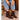 Mujer con vaqueros luciendo botines de tacón Bubble Bobble en café - © Calzados Modesto®