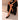 Mujer sentada con bailarina negra Pink Desert 6601-B, vista lateral de la pierna y calzado - © Calzados Modesto®