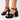 Sandalia Xti negra de plataforma con tira al tobillo y detalle de pespuntes, estilo moderno - © Calzados Modesto®