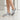 Zapatillas deportivas XTI de mujer en gris, estilo casual, con detalles blancos y suela de goma - © Calzados Modesto®